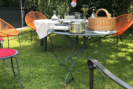 Garden table with pot, stove top and basket