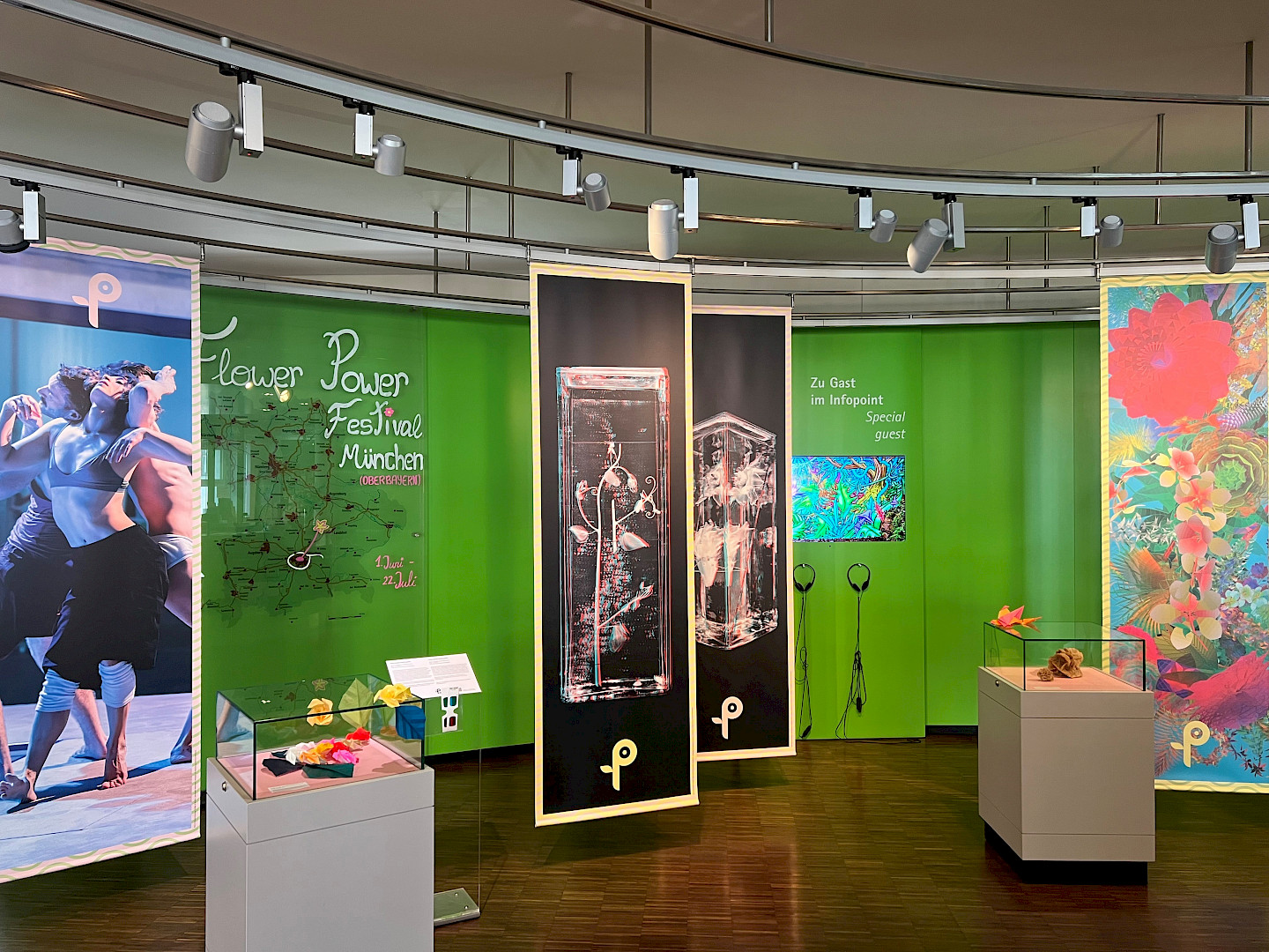 Exhibition with picture banners and showcases