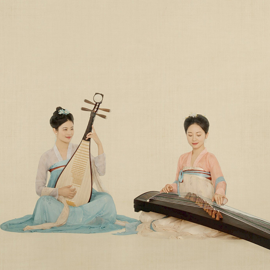 Illustration: The Silk String Ensemble in traditional dresses with traditional Chinese instruments.